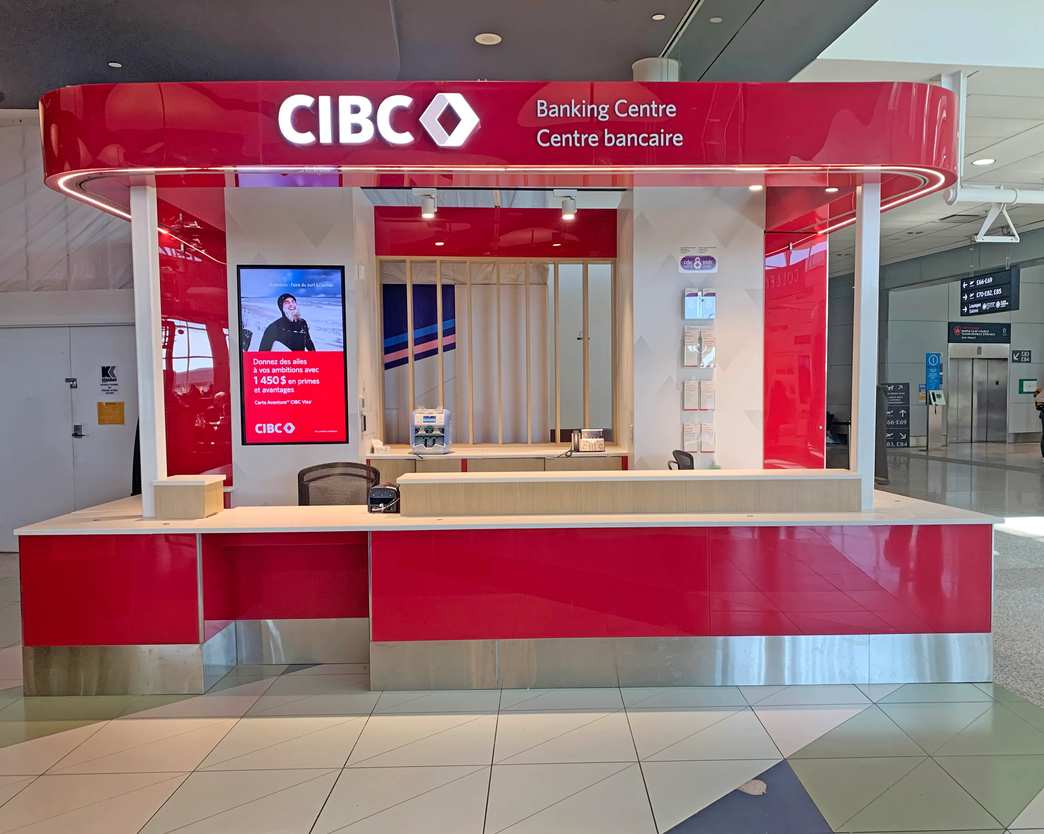 CIBC branded banking environment at Toronto Pearson Airport, the CIBC Banking Centre header spanning the top of the fixture